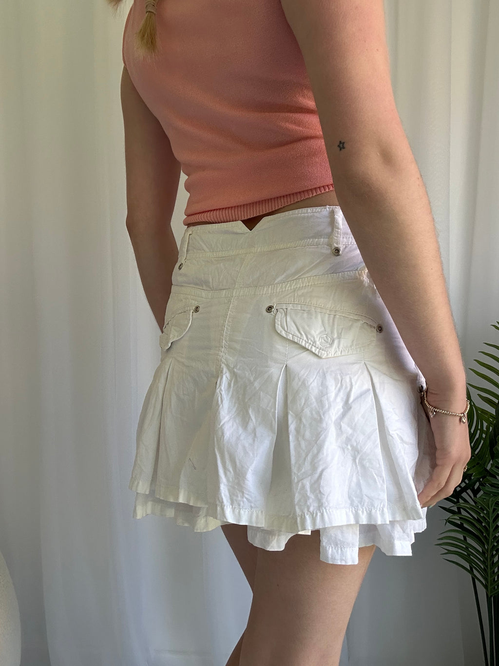 White ruffle cargo mini skirt